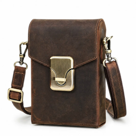 Brown leather push-lock crossbody bag white background front view