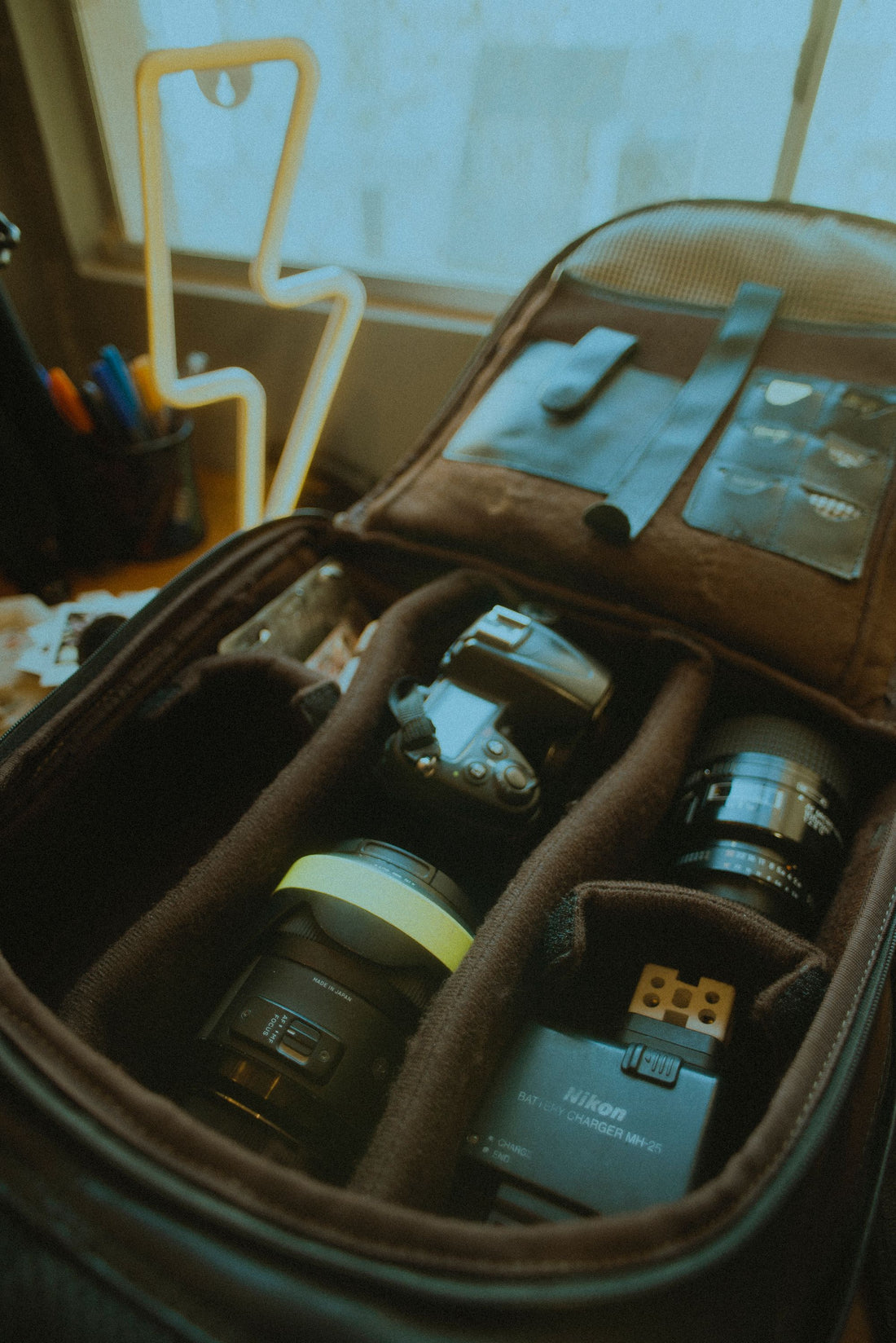 Camera bag with photography gear for travel