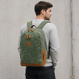 Vintage Leather Waxed Canvas Backpack exact product model front lifestyle