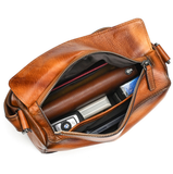 Woosir vintage leather crossbody bag open interior with essentials