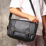 Leather messenger bag hardware detail