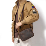 Adjustable strap leather crossbody bag detail