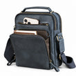 Navy genuine leather multi-pocket crossbody bag white background front view