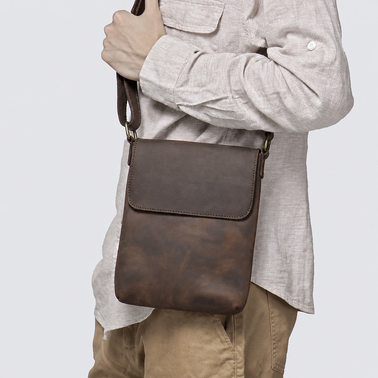 Vintage leather iPad crossbody bag lifestyle view