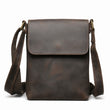 Dark brown genuine leather iPad crossbody bag white background front view