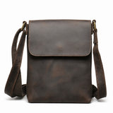 Dark brown genuine leather iPad crossbody bag white background front view
