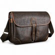 Large coffee leather crossbody messenger bag white background front view