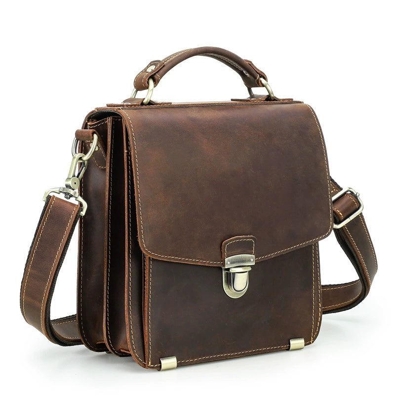 Brown leather messenger bag back view with zipper pocket