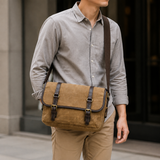 Waxed Canvas Messenger Bag with Leather Trim exact product model front lifestyle