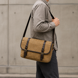 Waxed Canvas Messenger Bag with Leather Trim exact product model side lifestyle