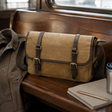 Waxed Canvas Messenger Bag with Leather Trim exact product scene travel lifestyle
