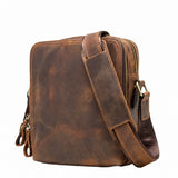 Vintage crazy horse leather crossbody bag on white background