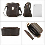 Leather messenger bag push lock and stitching detail