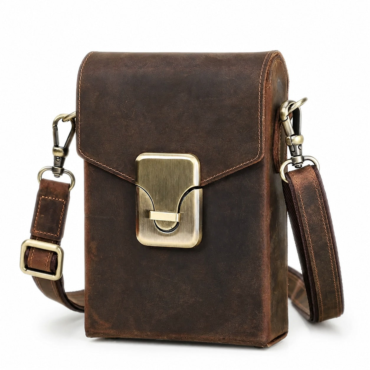 Brown leather push-lock crossbody bag white background front view
