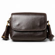 Brown leather small crossbody bag white background front view