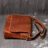 Vintage leather messenger bag back view