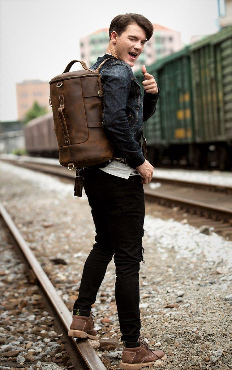 brown leather backpack with black shoes Woosir Leather Vintage Mens Backpack Large Barrel Shape