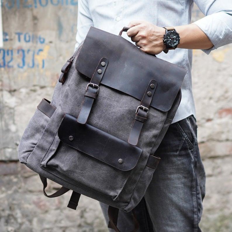 black leather canvas backpack Nerlion for Men Waxed Laptop Backpack 17.3 Inch Rucksack Vintage Travel Backpack (Black) : Electronics A secure zippered main closure protects your essentials Porter Black Leather Travel Rucksack