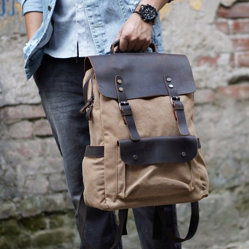 canvas and leather backpack grand rapids mi Explorer MoneyMaker | Camera Backpack the rugged Lennon Canvas Ambassador Leather Canvas Backpack